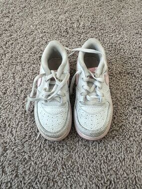 Nike Kids White Sneakers with Pink Accents